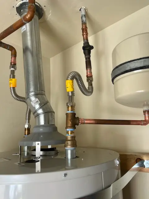 Water heater installation and plumbing repair in Milton